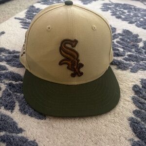 Tan base, green brim Chicago White Sox hat